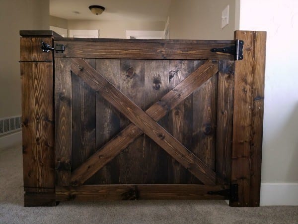 Barn Door Baby Gate Attached To Stair Wall And Banister Without Screws #remodelaholic