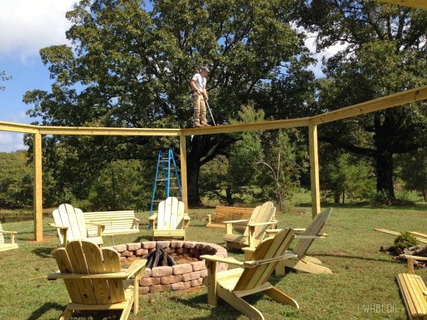 Building a Pergola with a Fire Pit and Adirondack Chairs by Little White House Blog featured on @Remodelaholic