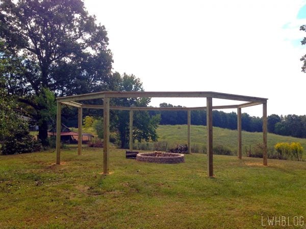 Creating a Pergola and Fire Pit by Little White House Blog featured on @Remodelaholic