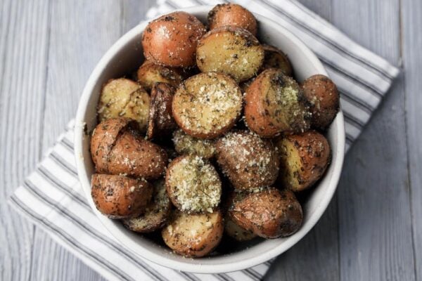 Herb Roasted Potatoes in a white bowl