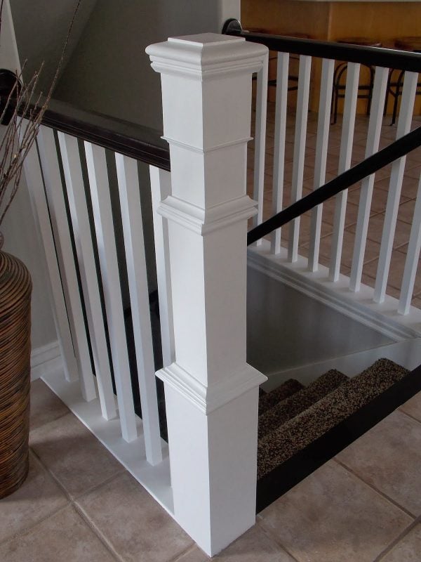 how to build a newel post around an existing banister - TDA Designs featured on @Remodelaholic