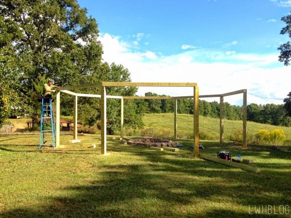 How to Build a Pergola with Lots of Seating by Little White House Blog featured on @Remodelaholic