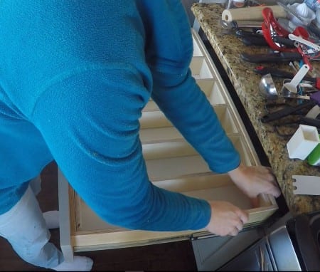 Fitting in dividers on the larger utensil drawer