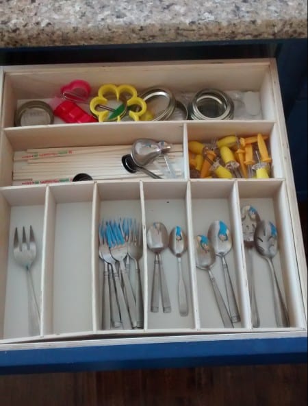 Removeable Drawer organizers made out of thin plywood featured on Remodelaholic.com