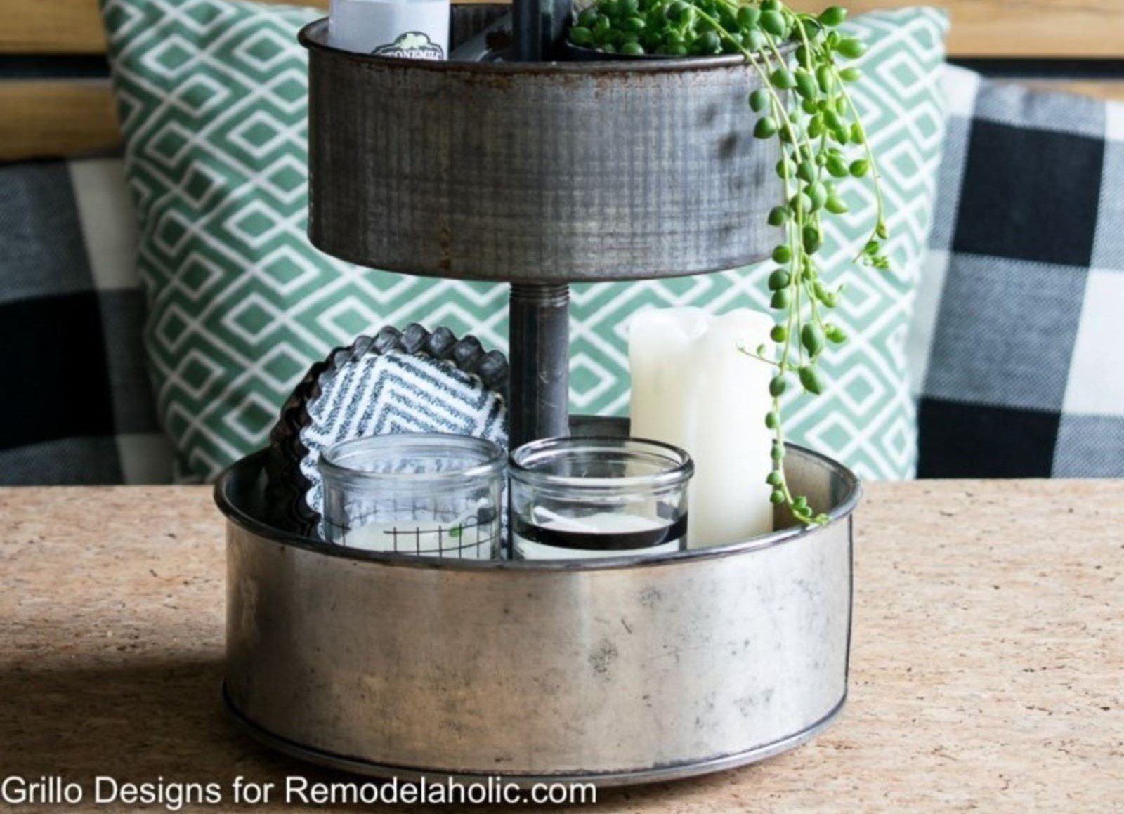 Rotating Three Tier Metal Tray Organizer On Wood Table With Salt Candles And Green Plant Inside (1) (1)