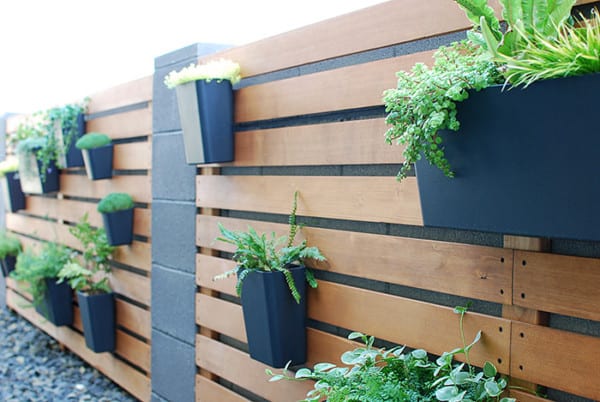 Tutorial, Modern Wood Slat Garden Wall Of Planters Using IKEA Sunnersta And Variera Kitchen Organizers, The Garden Glove Featured On Remodelaholic